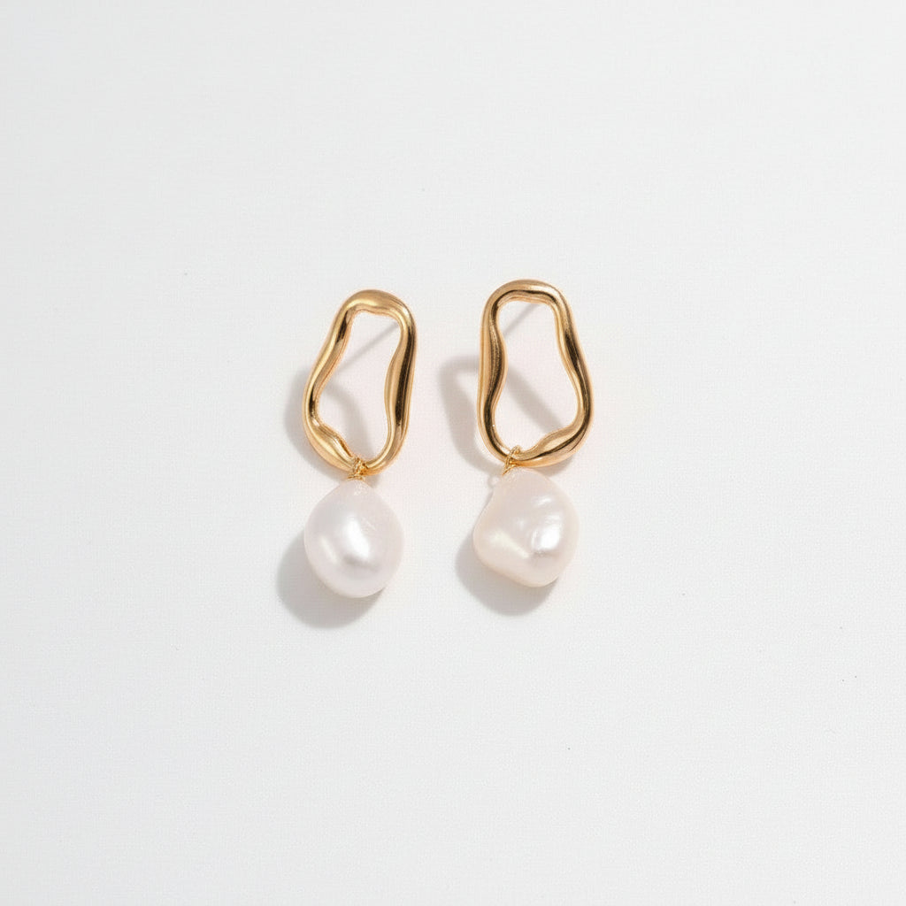 Chanqinfang elegant gold irregular hoop earrings with white natural pearl dangles on white background