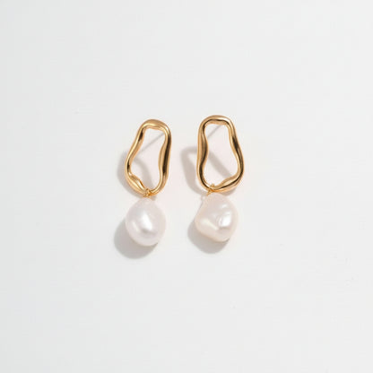 Chanqinfang elegant gold irregular hoop earrings with white natural pearl dangles on white background